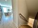 Stairway and hallway with view to the dining area at 538 Sawnee Village Blvd # D67, Cumming, GA 30040
