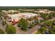 Aerial view of a commercial center with retail and restaurant spaces and ample parking at 556 Sawnee Village Blvd # D76, Cumming, GA 30040