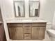 Bathroom featuring double vanity with modern fixtures and coordinated decor, creating a luxurious and functional space at 556 Sawnee Village Blvd # D76, Cumming, GA 30040
