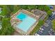 This aerial view showcases a beautifully designed pool, perfect for relaxing swims and enjoying the sunshine at 6730 Waterbury Way, Cumming, GA 30040