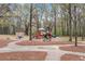 Enjoy a fun afternoon at the community playground, featuring slides, climbing structures, and plenty of space to play at 6730 Waterbury Way, Cumming, GA 30040