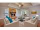 Inviting living area features a brick fireplace and hardwood floors, creating a cozy atmosphere at 806 Jefferson Sw Ct, Conyers, GA 30094