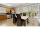 Eat-in kitchen with natural light, stainless steel appliances, and a breakfast table at 313 Daniel Mill Xing, Villa Rica, GA 30180