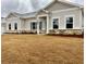 Charming single-story home with neutral siding, brick accents and a well-manicured lawn at 3904 Shelleydale Dr, Powder Springs, GA 30127