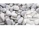A close-up of smooth, white decorative stones, perfect for landscaping or interior design at 530 Sawnee Village Blvd # D63, Cumming, GA 30040