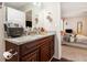 Bathroom featuring a large vanity and view to the bedroom at 647 Sunshine Nw Trce, Acworth, GA 30102