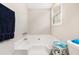 Bathroom featuring a large bathtub at 647 Sunshine Nw Trce, Acworth, GA 30102