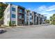 Modern apartment building featuring private balconies and ample parking spaces at 1155 Custer Se Ave # 209, Atlanta, GA 30316