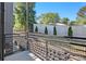 Balcony with a metal railing and garden view at 1155 Custer Se Ave # 209, Atlanta, GA 30316