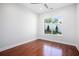 Bedroom with ceiling fan, hardwood floors, and natural light from the exterior window at 1155 Custer Se Ave # 209, Atlanta, GA 30316
