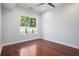 Bedroom with ceiling fan, hardwood floors, and natural light from the exterior window at 1155 Custer Se Ave # 209, Atlanta, GA 30316