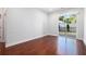 Bright living room with hardwood floors and sliding glass doors to the outside patio at 1155 Custer Se Ave # 209, Atlanta, GA 30316