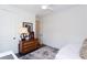Neutral bedroom with dark hardwood floors and ceiling fan at 1515 Walker Ave, Atlanta, GA 30337