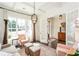 Bright and airy living room with large windows, stylish decor, and ample seating at 1515 Walker Ave, Atlanta, GA 30337