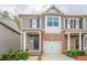Charming townhome with brick accents, attached garage, and well-maintained landscaping at 2705 Maple Park Pl # 29, Cumming, GA 30041