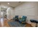 Elegant hallway with hardwood floors and accent wall at 2705 Maple Park Pl # 29, Cumming, GA 30041