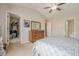 Carpeted primary bedroom features a walk-in closet and ensuite bathroom at 2705 Maple Park Pl # 29, Cumming, GA 30041