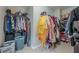 Organized walk-in closet with shelving, hanging rods, and ample storage for clothes and accessories at 2705 Maple Park Pl # 29, Cumming, GA 30041