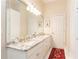 Bright, clean bathroom with double vanity, granite countertop, and storage, offering style and functionality at 3022 Loridan Se Way, Atlanta, GA 30339