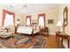 Inviting bedroom features warm decor, natural light, and classic furnishings at 3022 Loridan Se Way, Atlanta, GA 30339