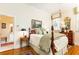 Comfortable bedroom featuring wood floors and stylish decor, creating a relaxing retreat at 3022 Loridan Se Way, Atlanta, GA 30339