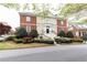 Beautiful brick house boasting lush landscaping, elegant stairs, and timeless design at 3022 Loridan Se Way, Atlanta, GA 30339