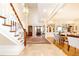 Spacious foyer with staircase and elegant architectural details flowing into other living areas at 3022 Loridan Se Way, Atlanta, GA 30339