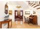 Inviting entryway boasting stylish hardwood floors, classic wooden furniture, and eye-catching decor at 3022 Loridan Se Way, Atlanta, GA 30339