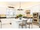 Bright kitchen features a center island, stainless steel appliances, and modern lighting at 3022 Loridan Se Way, Atlanta, GA 30339