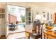 Stylish living room offers french doors, open access to a patio with a pool, and bright lighting at 3022 Loridan Se Way, Atlanta, GA 30339