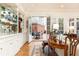 Charming living room with french doors leading to a patio, light colored walls, and nice hardwood floors at 3022 Loridan Se Way, Atlanta, GA 30339
