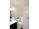 Bathroom featuring walk-in bathtub, vanity, and ample lighting at 3725 Rifflewood Way, Douglasville, GA 30135