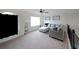 Cozy upstairs loft area with comfortable seating and great natural light at 3725 Rifflewood Way, Douglasville, GA 30135