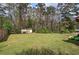 Fenced yard with shed and trees. Perfect for privacy and outdoor enjoyment at 38 E Boxwood Se Dr, Cartersville, GA 30121