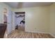 Bedroom featuring closet space, hardwood flooring, natural light, and adjacent door at 38 E Boxwood Se Dr, Cartersville, GA 30121