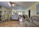 Spacious living room featuring wood-look laminate floors and neutral paint at 38 E Boxwood Se Dr, Cartersville, GA 30121