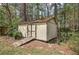 A weathered shed offers practical storage solutions at 38 E Boxwood Se Dr, Cartersville, GA 30121