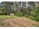 A storage shed sits nestled on the expansive lawn at 38 E Boxwood Se Dr, Cartersville, GA 30121