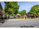 Street view of commercial building featuring manicured lawns and mature shade trees at 1456 Wicker Wood Se Pl # 15, Smyrna, GA 30080
