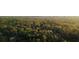 Expansive aerial view of property surrounded by lush forest, creating a private oasis at 1919 Wellbourne Ne Dr, Atlanta, GA 30324