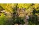 An overhead perspective shows a backyard with a stone fountain and flowering trees at 1919 Wellbourne Ne Dr, Atlanta, GA 30324
