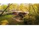 Aerial shot of the home's private backyard featuring a patio and well-manicured lawn at 1919 Wellbourne Ne Dr, Atlanta, GA 30324