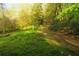 Scenic landscape with a path through a lush wooded area at 1919 Wellbourne Ne Dr, Atlanta, GA 30324