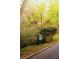 Morningside Nature Preserve entrance with tree lined street offering serene environment at 1919 Wellbourne Ne Dr, Atlanta, GA 30324
