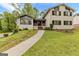 Charming two-story home with a landscaped front yard and inviting entrance at 5429 Golfcrest Cir, Stone Mountain, GA 30088