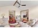 Bright living room featuring vaulted ceilings, hardwood floors, and comfortable seating at 5429 Golfcrest Cir, Stone Mountain, GA 30088