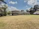 Spacious backyard offering a large lawn and potential for outdoor living and entertaining at 1717 Ramblewood Way, Snellville, GA 30078