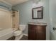 Classic bathroom featuring a stone-look sink vanity, and a shower-over-bath at 1717 Ramblewood Way, Snellville, GA 30078