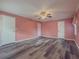 Spacious bedroom featuring new gray laminate flooring and a ceiling fan at 1717 Ramblewood Way, Snellville, GA 30078