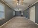 Expansive living room boasts new carpet and large windows at 1717 Ramblewood Way, Snellville, GA 30078